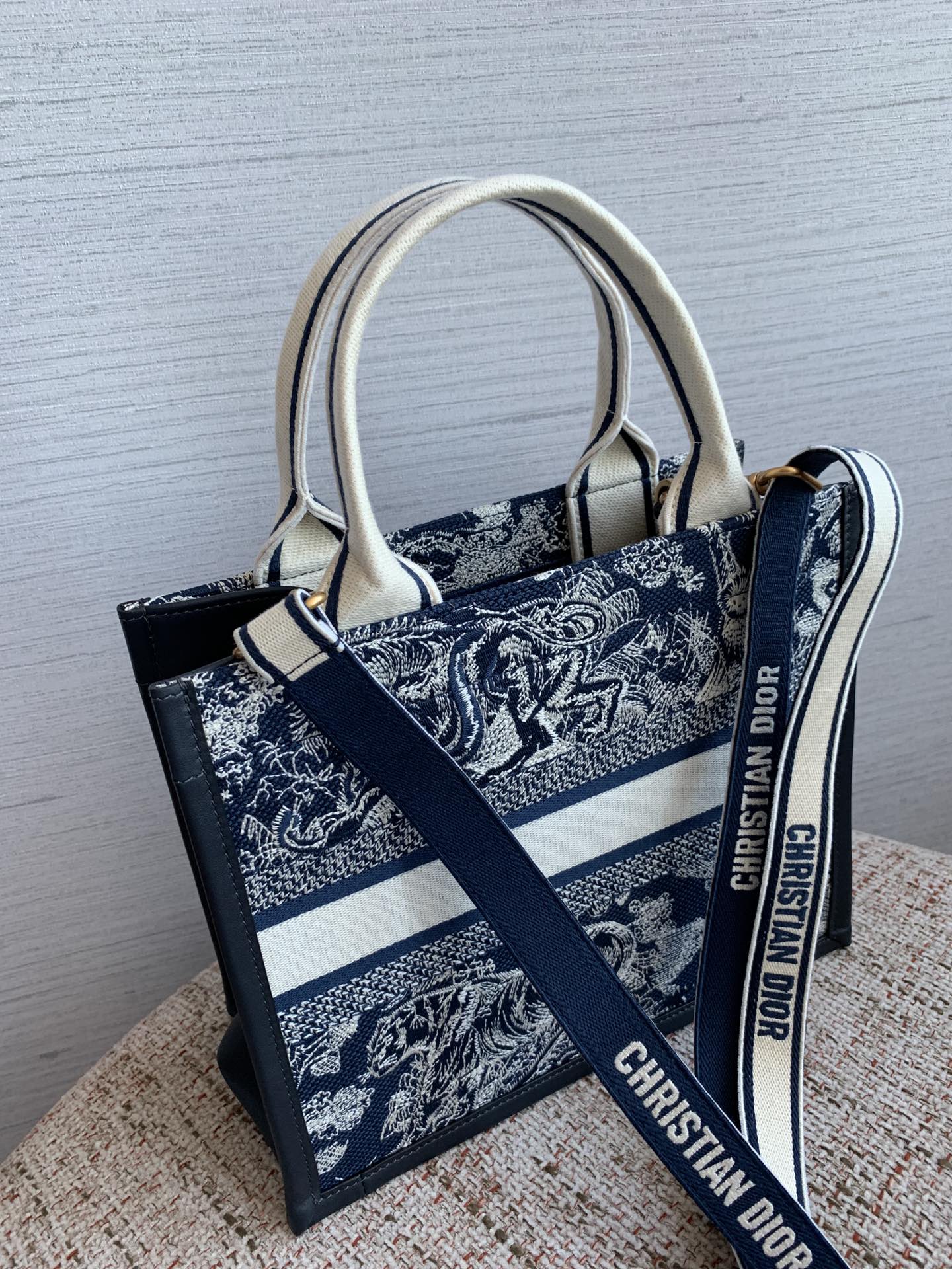 Bagsaaa Small D10r Book Tote Blue and Ecru Toile de Jouy Reverse Embroidery and Blue Calfskin - 26.5 x 22 x 14 cm