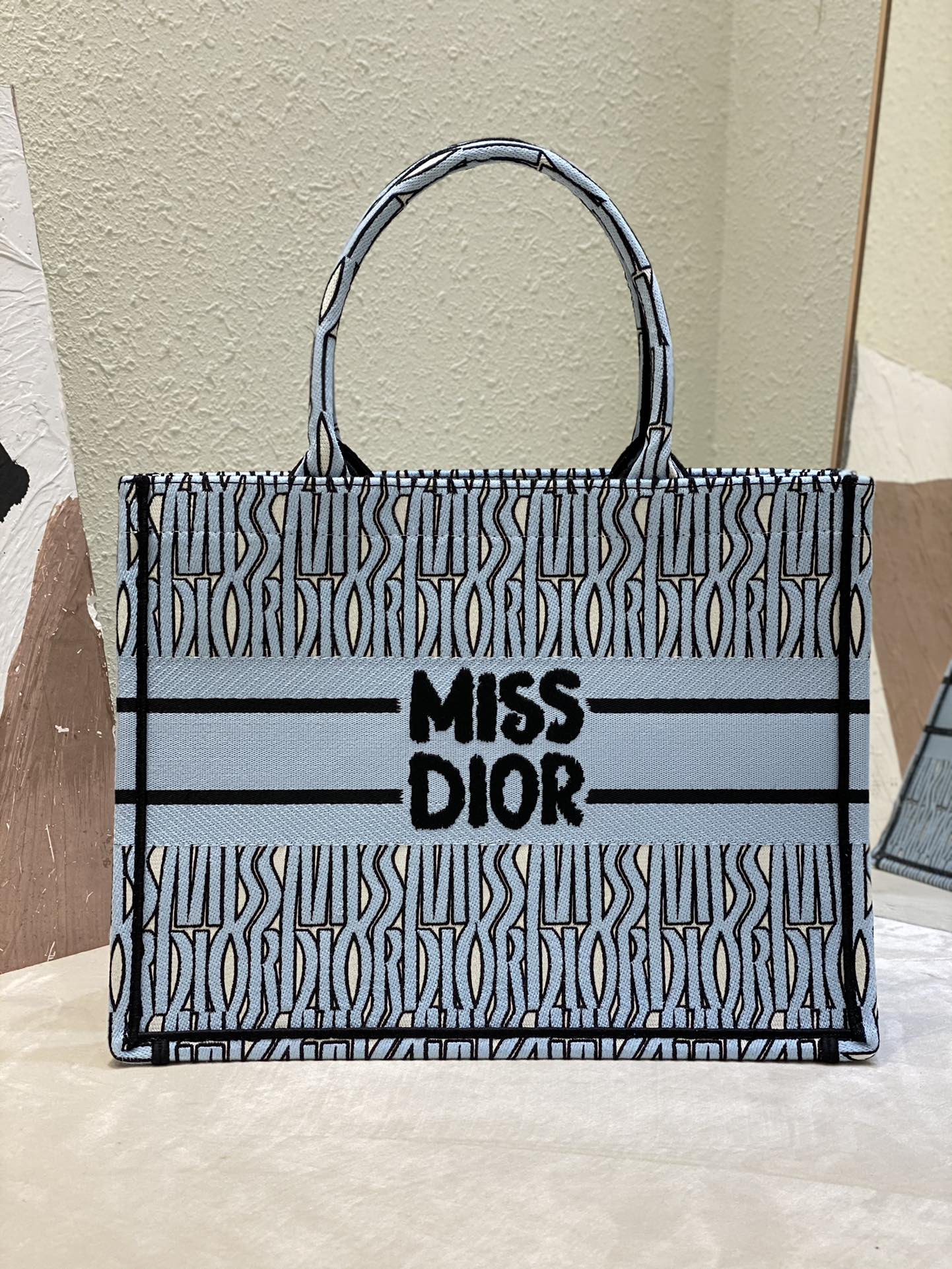 Bagsaaa Medium D10r Book Tote Pale Blue and Black Miss D10r Allover Embroidery - 36 x 27.5 x 16.5 cm