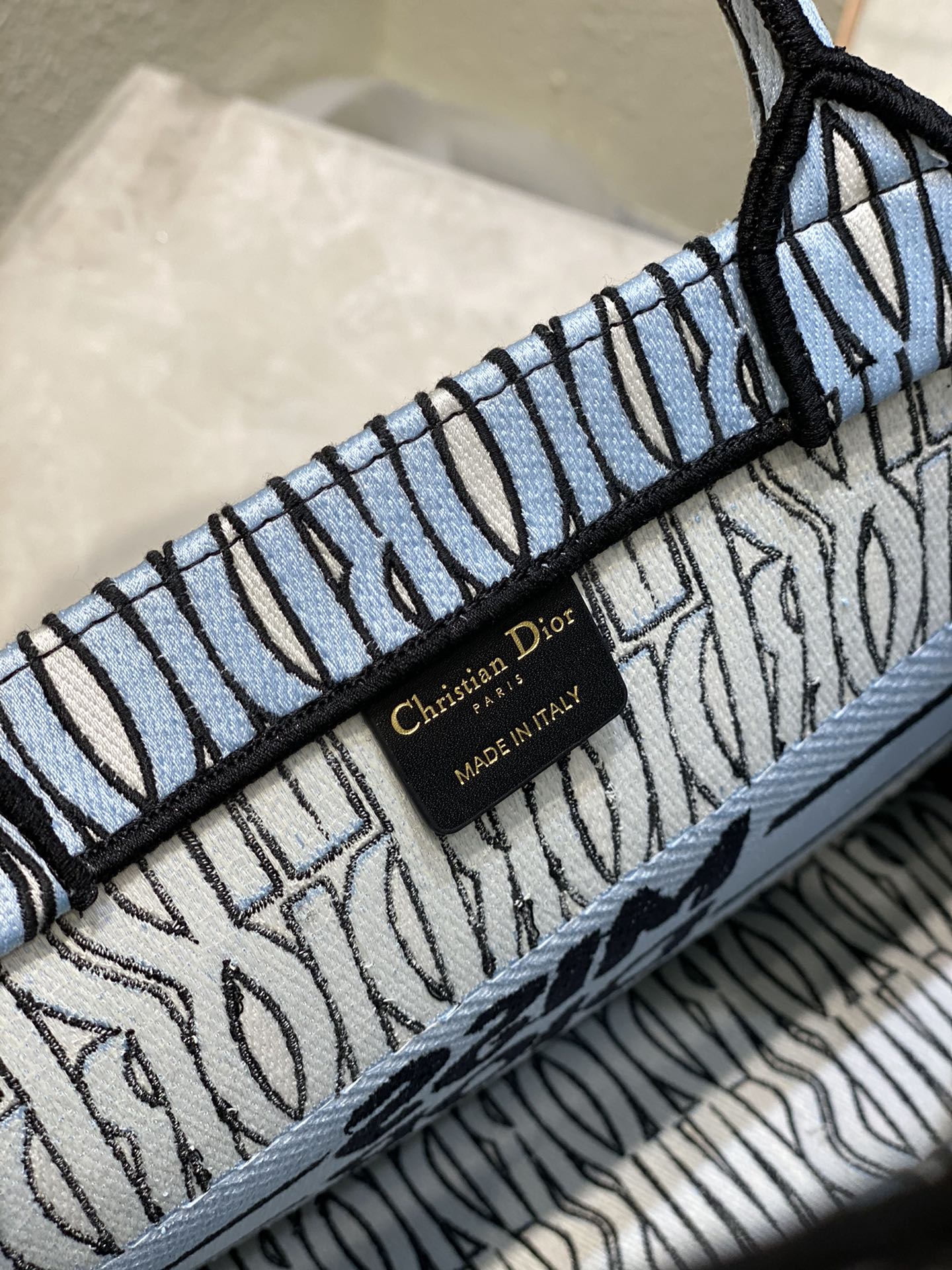 Bagsaaa Medium D10r Book Tote Pale Blue and Black Miss D10r Allover Embroidery - 36 x 27.5 x 16.5 cm