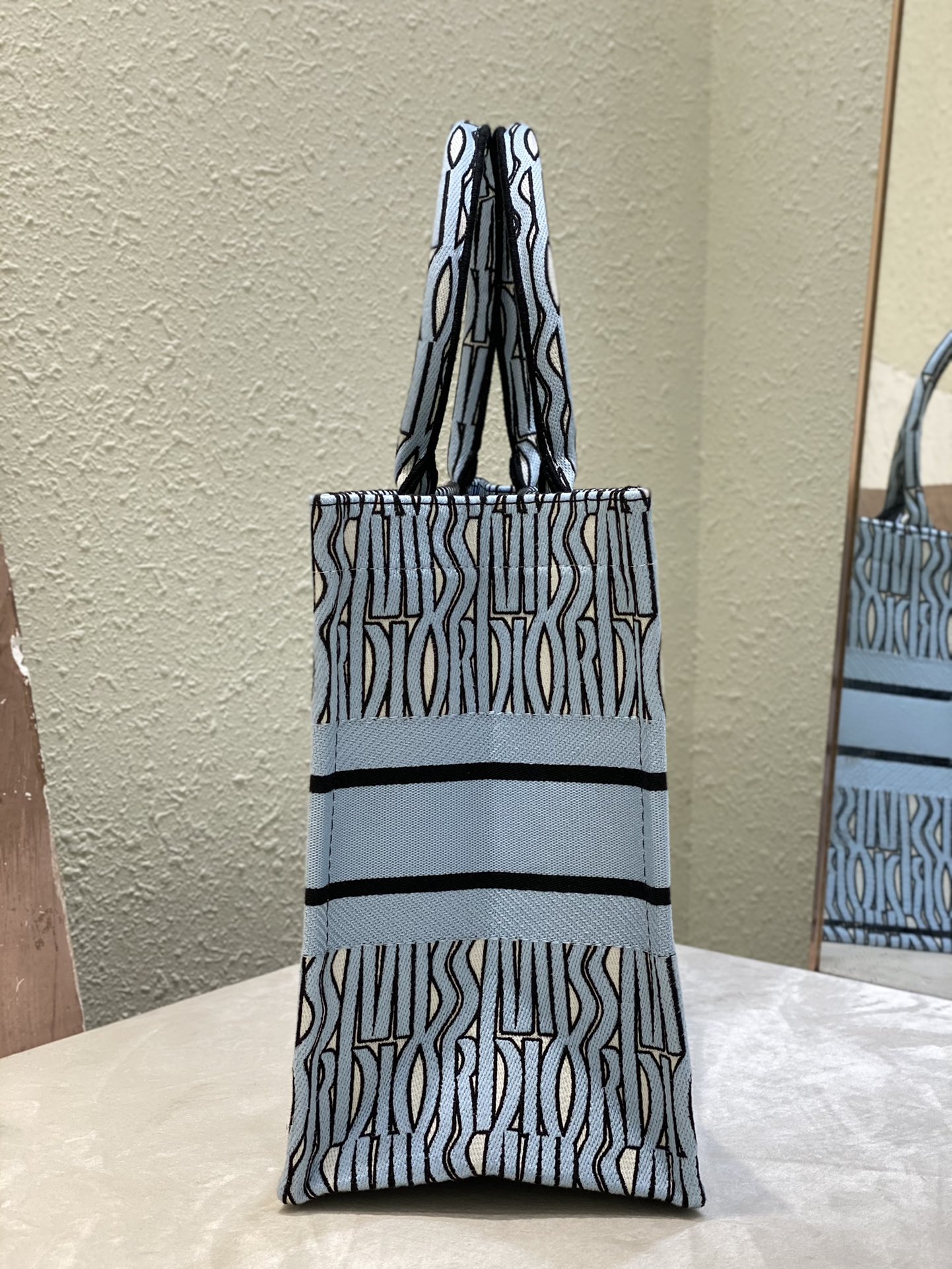 Bagsaaa Medium D10r Book Tote Pale Blue and Black Miss D10r Allover Embroidery - 36 x 27.5 x 16.5 cm