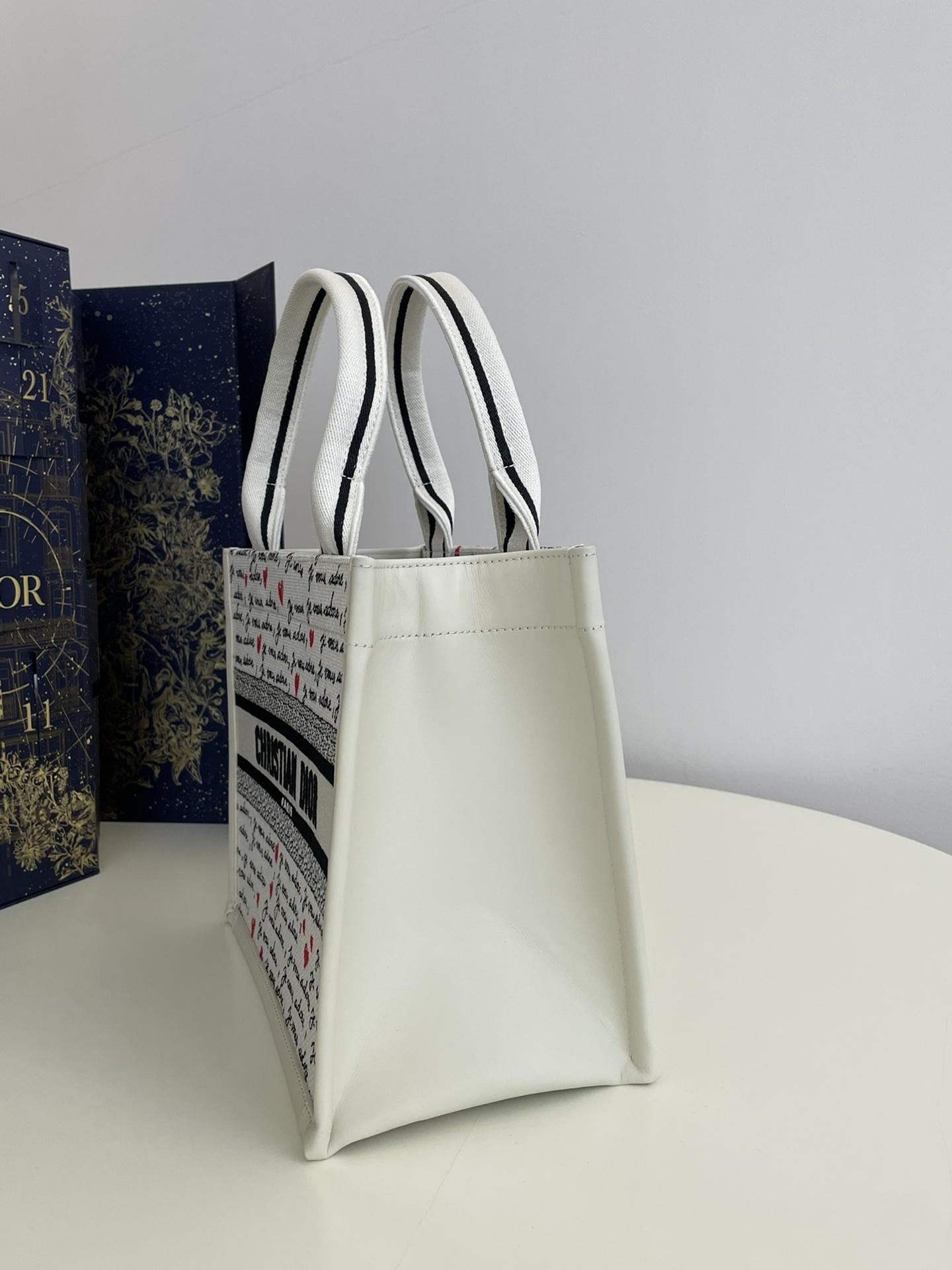 Bagsaaa D10ramour Small D10r Book Tote White Embroidery with Black and Red Je Vous Adore Motif and White Calfskin - 26.5 x 22 x 14 cm