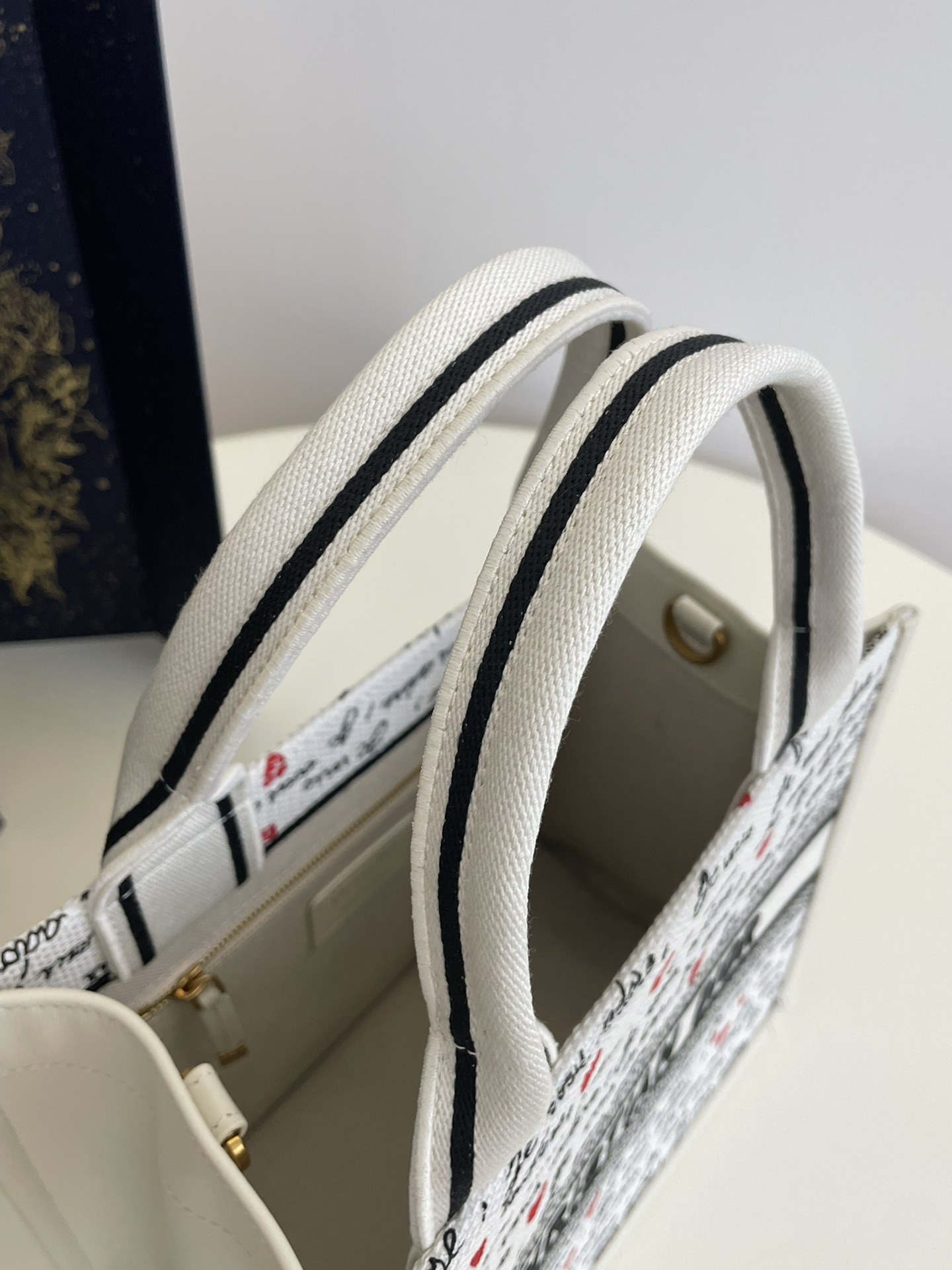 Bagsaaa D10ramour Small D10r Book Tote White Embroidery with Black and Red Je Vous Adore Motif and White Calfskin - 26.5 x 22 x 14 cm