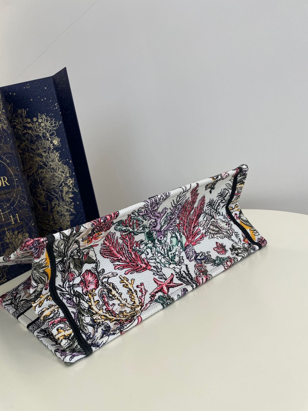 Bagsaaa Medium D10r Book Tote Latte Embroidery with Multicolor D10r Cabinet de la Mer Motif - 36 x 27.5 x 16.5 cm